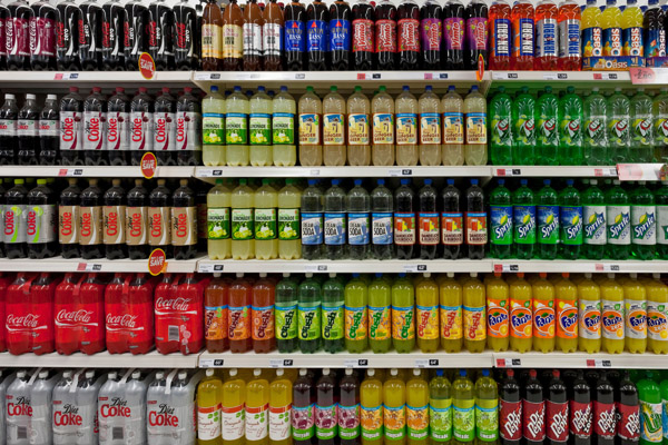 Supermarket gliders shelf bottle